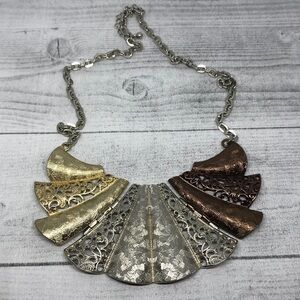 Statement style mixed metal necklace
